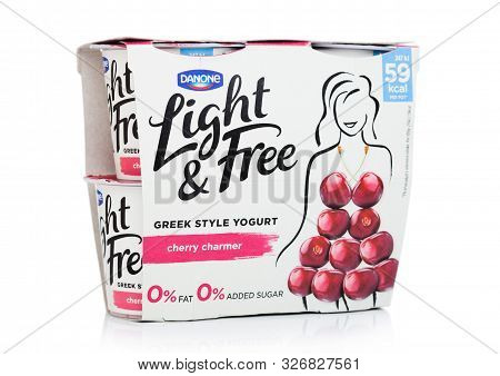 London, Uk - October 10, 2019: Pack Of Danone Light & Free Greek Style Natural Yogurt With Cherry On