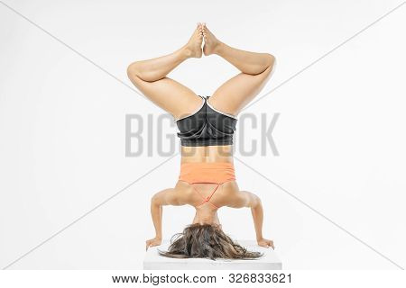 Cute Girl Doing Yoga On White Background Isolated.