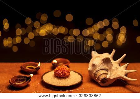 Diwali - An Indian Festival Known As Festival Of Lights. Religious Traditional Clay Diya Lit On A Wo