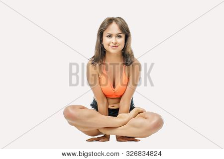 Cute Girl Doing Yoga On White Background Isolated.