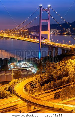 Sunset and light illumination of Tsing ma bridge landmark suspension bridge in Tsing yi area of Hong Kong China.