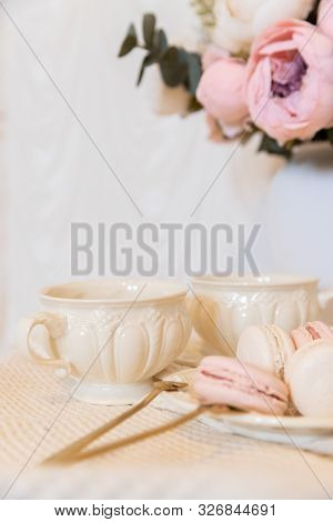 Porcelain Tea Party Set. Still Life. Background. French Dessert Makaroon