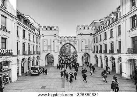 Munich, Germany - Nov 29, 2016: People Walking Along Through The Karlstor Gate In Munich, Germany.