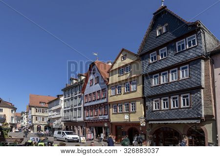 Wertheim, Germany - Apr 6, 2018: People Visit The Pedestrian Zone Of The Scenic Medieval Village Of 