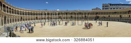 Ronda, Spain - May 17, 2018:  Visitors To The Plaza De Toros Or Bullring. The Bullring At Ronda Is T