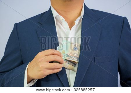 Money In Vietnam Hold On Hand Business Man Wearing A Blue Suit (socialist Republic Of Vietnam), Dong