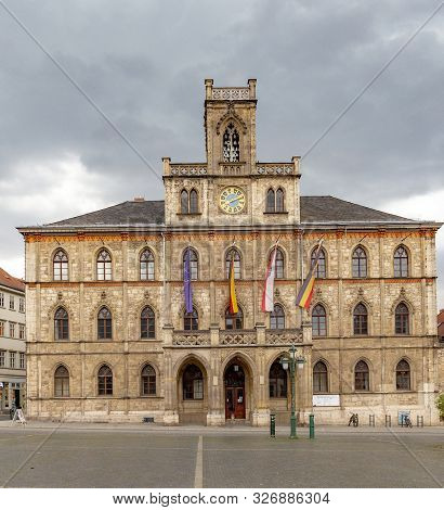 Weimar, Germany - Jul 28, 2018: Famous Town Hall In Weimar With Flags.