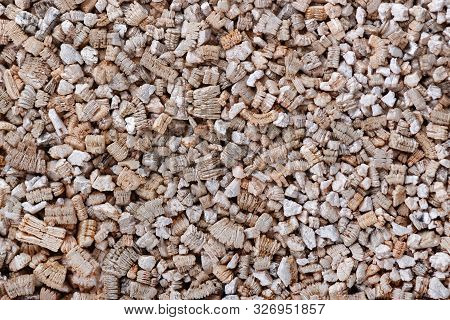Vermiculite Background. Exfoliated Perlite And Vermiculite Texture Background. Mineral Used In Garde