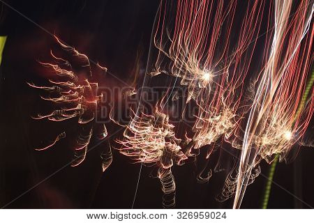 Red And Gold Fireworks Time Lapse Trails Painting The Night Sky
