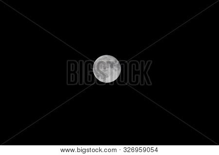 The Super Moon In Black Night Sky