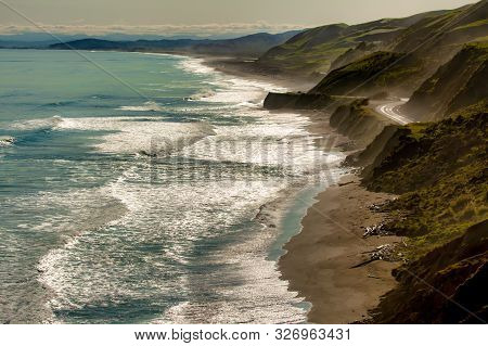 The Dramatic Rugged Coastline And Cliff Of The Gisborne Coastline