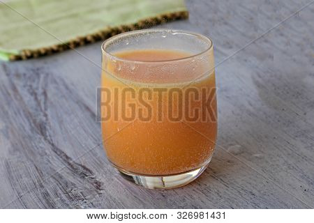 Effervescent Tablet On White Background And Orange Effervescent Bubbles Of Calcium And Vitamin C Eff
