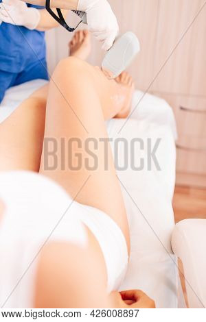 Cosmetology Procedure For Hair Removal From The Master Of Laser Hair Removal In A Cosmetic Spa Clini
