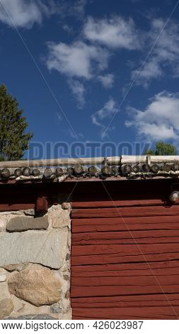 Gammelstad, Lulea, Swedish Lapland, Sweden, Europe. Wooden, Stone House On Sky Background