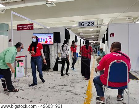 Selangor, Malaysia - July 6,2021 : Public People Can Seen Waiting Patiently In The Hall For Their Tu