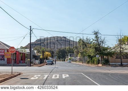 Touws River, South Africa - April 20, 2021: A Street Scene, With Buildings, People And Vehicles, In 