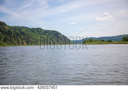 River Tom Flowing Through The Taiga Forests, South Siberia, Russia