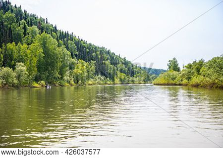 River Taidon Flowing Through The Taiga Forests, South Siberia, Russia