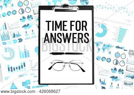 Business Layout. Text Time For Answers On Paper. Glasses, Pen And Clipboard.