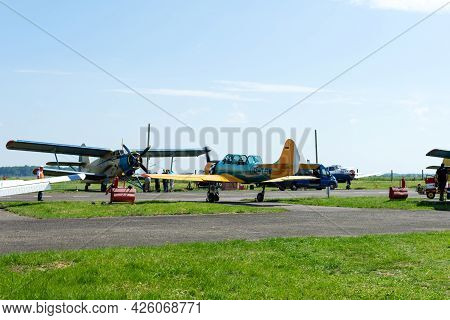 Gorodok. Ukraine. June 6, 2021. Tsuniv Airfield. Biplane, And A Training Aircraft, Parked At The Air