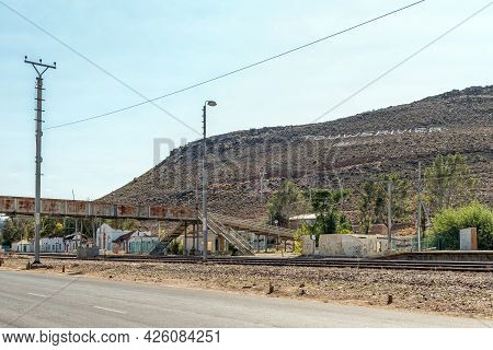 Touws River, South Africa - April 20, 2021: Rusted Pedestrian Bridge At The Railway Station In Touws