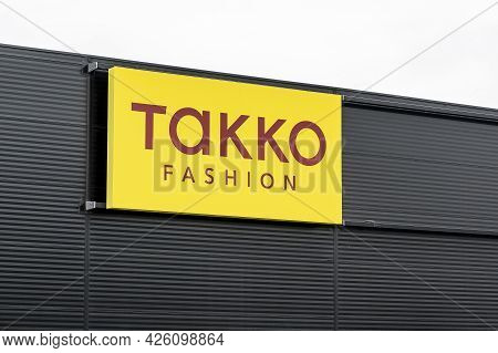 Ostrava, Czech Republic - May 3, 2021: The Yellow Banner Of Takko Fashion Company Above Its Departme