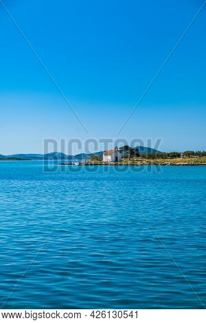 Church On The Small Island Of St Justina In Adriatic Sea In Croatia, Near Town Of Pakostane