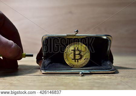 Usb Cable Connects To Crypto Wallet. Crypto And Bitcoin Wallet Concept. Ryptocurrency Trading Exchan
