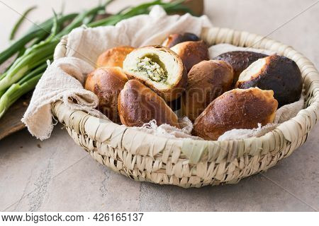 Russian Pastries (pirogi) Filled With Eggs And Green Onion