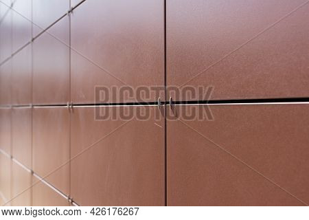 Background Texture Of Rectangular Smooth Brown Tiles. Stone Street Covering Of Wall, Masonry Of Buil