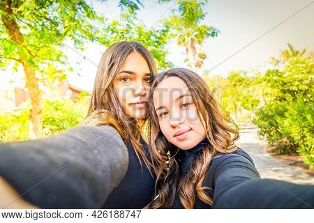 Two Happy Teenager Girls Making Selfie Shot Together - Friendsheep And Youth Concept, Summer Ourdoor