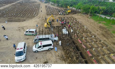 Aerial View Of Funeral Procession At Rorotan, North Jakarta. Special Graves Infected With The Corona