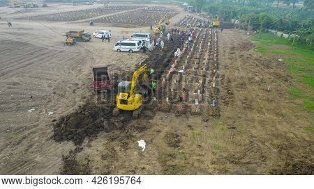 Aerial View Of Funeral Procession At Rorotan, North Jakarta. Special Graves Infected With The Corona