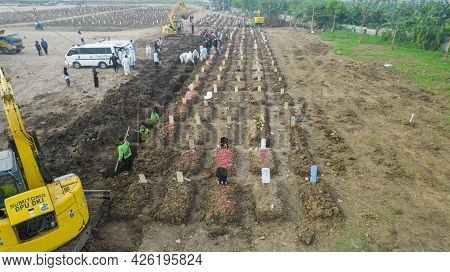 Aerial View Of Funeral Procession At Rorotan, North Jakarta. Special Graves Infected With The Corona