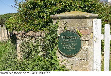 Old Hunstanton, Norfolk, England - June 13 2021. The Old Lighthouse Round Green Sign Close Up.