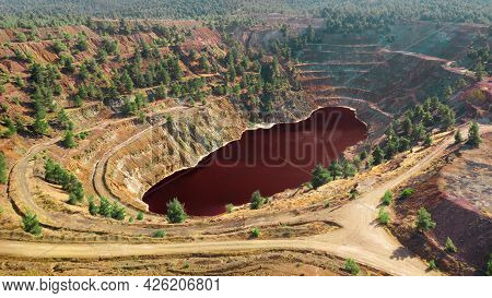 Acidic Red Lake In Open Pit Of Abandoned Kokkinopezoula Copper Mine In Mitsero, Cyprus