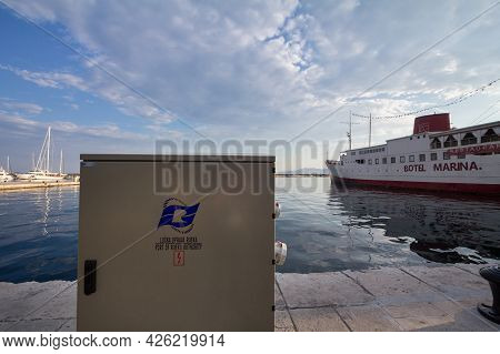 Rijeka, Croatia - June 17, 2021: Logo Of Lucka Uprava Rijeka On One Of Their Quays With Ships In Bac