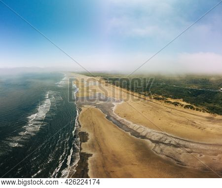 Sunny Cliffs and beach at Blackhall Rocks and Cromdon Dene Beach