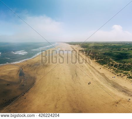 Sunny Cliffs and beach at Blackhall Rocks and Cromdon Dene Beach