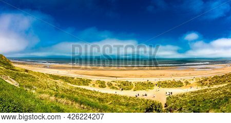 Sunny Cliffs and beach at Blackhall Rocks and Cromdon Dene Beach