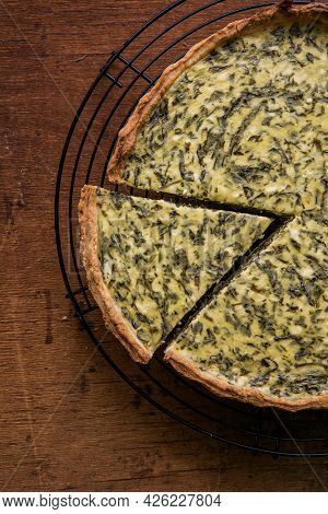 Quiche With Spinach - Traditional Dish Of French Cuisine. Spinach  Tart