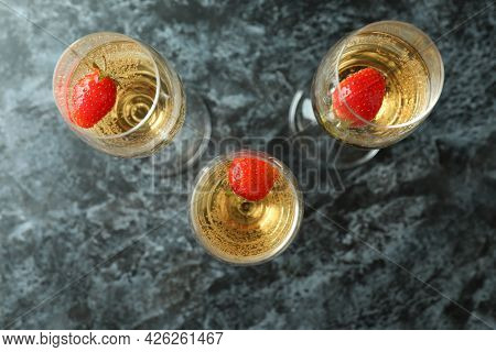 Concept Of Delicious Drink With Rossini Cocktail On Black Smoke Table
