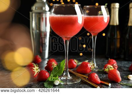 Concept Of Delicious Drink With Rossini Cocktail On Background With Blurred Lights