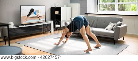 Online Yoga Workout In Living Room. Women Classes And Exercises
