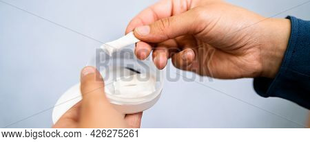 Woman Chewing Wet Moist Nicotine Tobacco Snus Product
