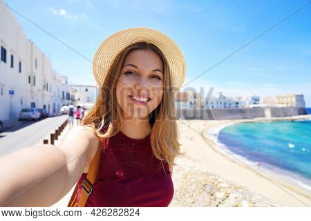 Happy Young Woman Taking Self Picture By Smartphone Capturing Moments On Summer Vacations Trip