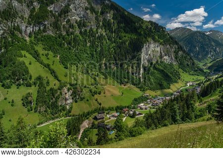 Summer Valley With Grossarler Ache Small River And Blue Cloudy Sky
