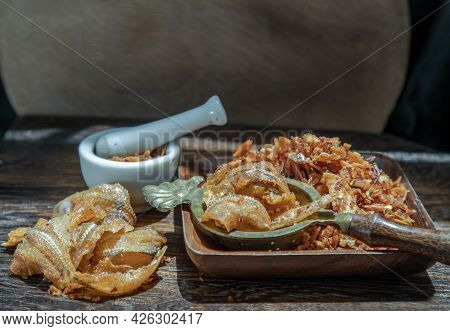 Dried Chilli Paste With Crispy Fish Thai Style Or Crispy Fish Chilli Paste In Ceramic White Cup On W