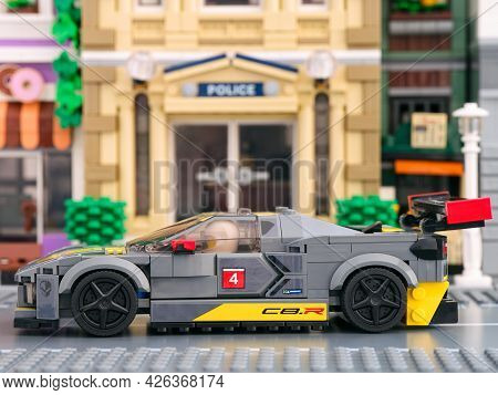 Tambov, Russian Federation - July 02, 2021 Lego Chevrolet Corvette C8.R car by LEGO Speed Champions on a city street