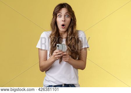 Shocked Impressed Speechless Girl Say Wow Curly Hairstyle Stare Camera Astonished Hold Smartphone Re